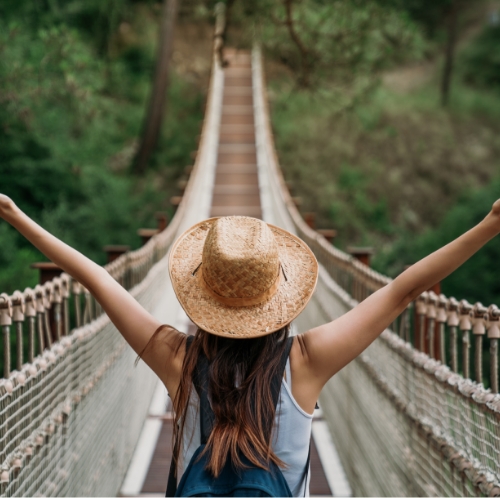 Close up of person biking down a trail