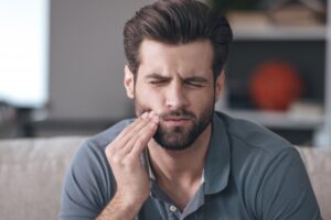 Man with a severe toothache